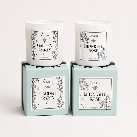 Two candles named 'Midnight Rose' and 'Garden Party' in their packaging on a white background.